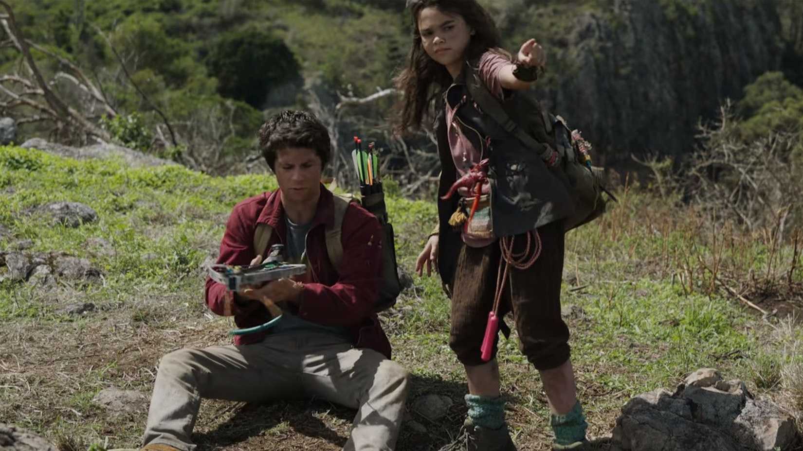 Minnow teaching Joel to use a bow in Love and Monsters