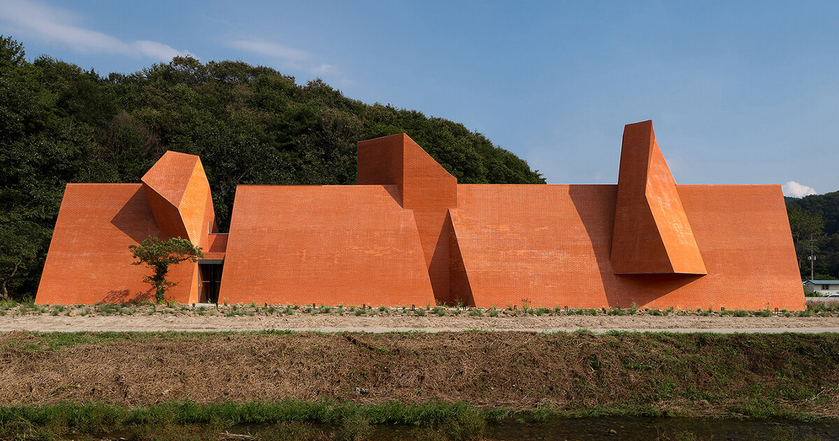 this monolithic café in south korea evokes an ancient fortress