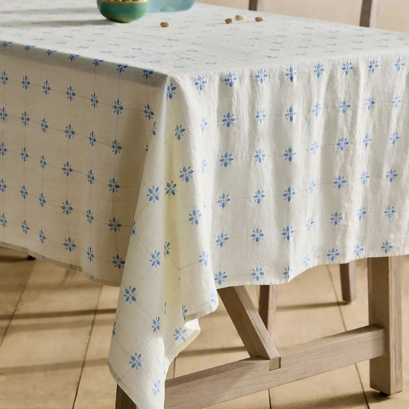 cream and blue patterned tablecloth