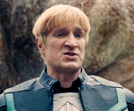 Nathan Fillion as Guy Gardner scoffing in Superman