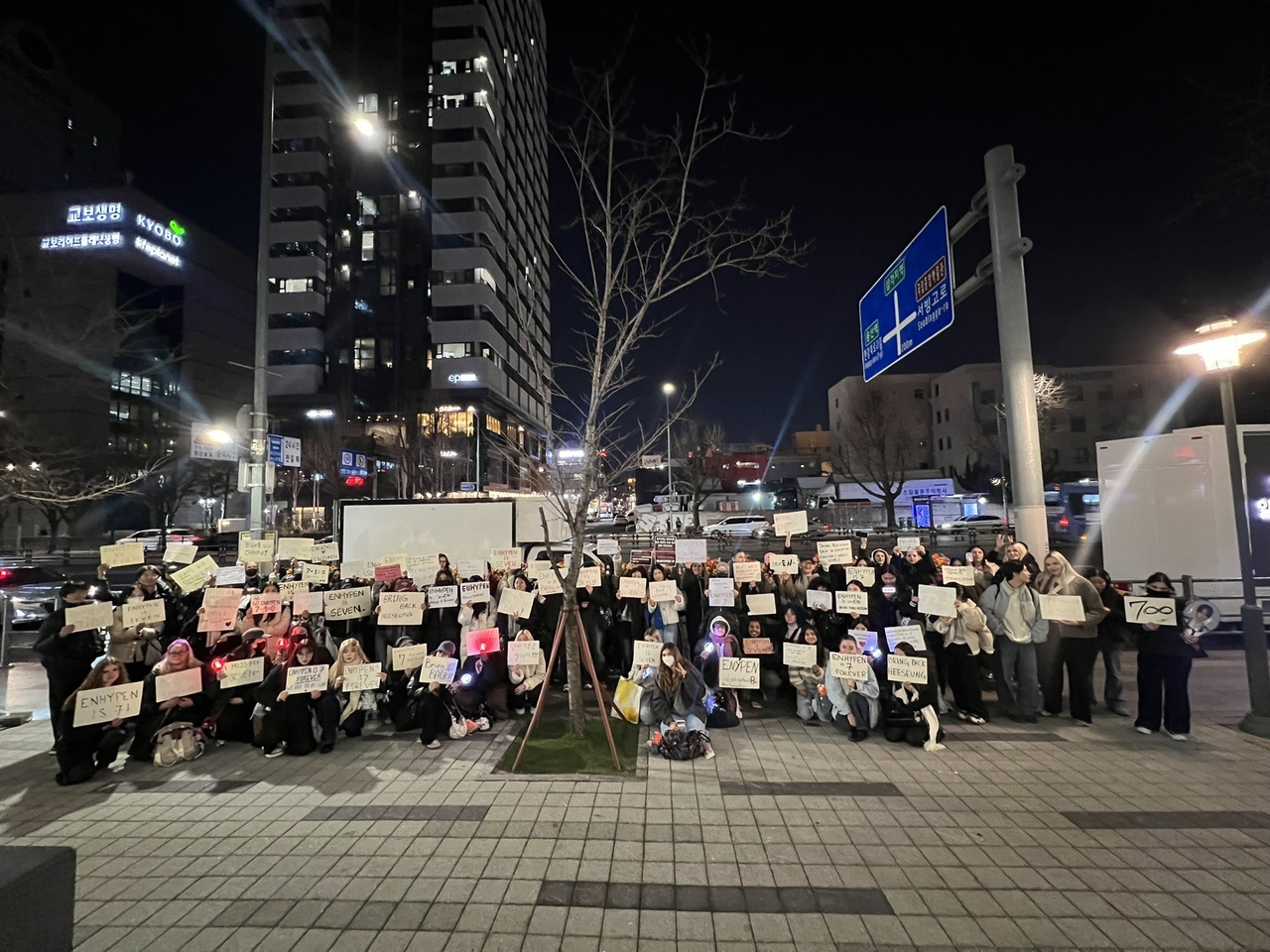 Enhypen's international fans gather for a protest in front of Hybe’s headquarters in Seoul on March 12. (Courtesy of Shivani Srinivasan)