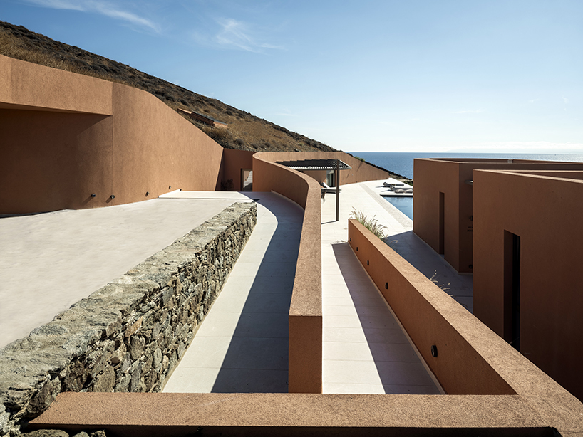 olen resort embeds into greek island slope across three terraced levels - 3