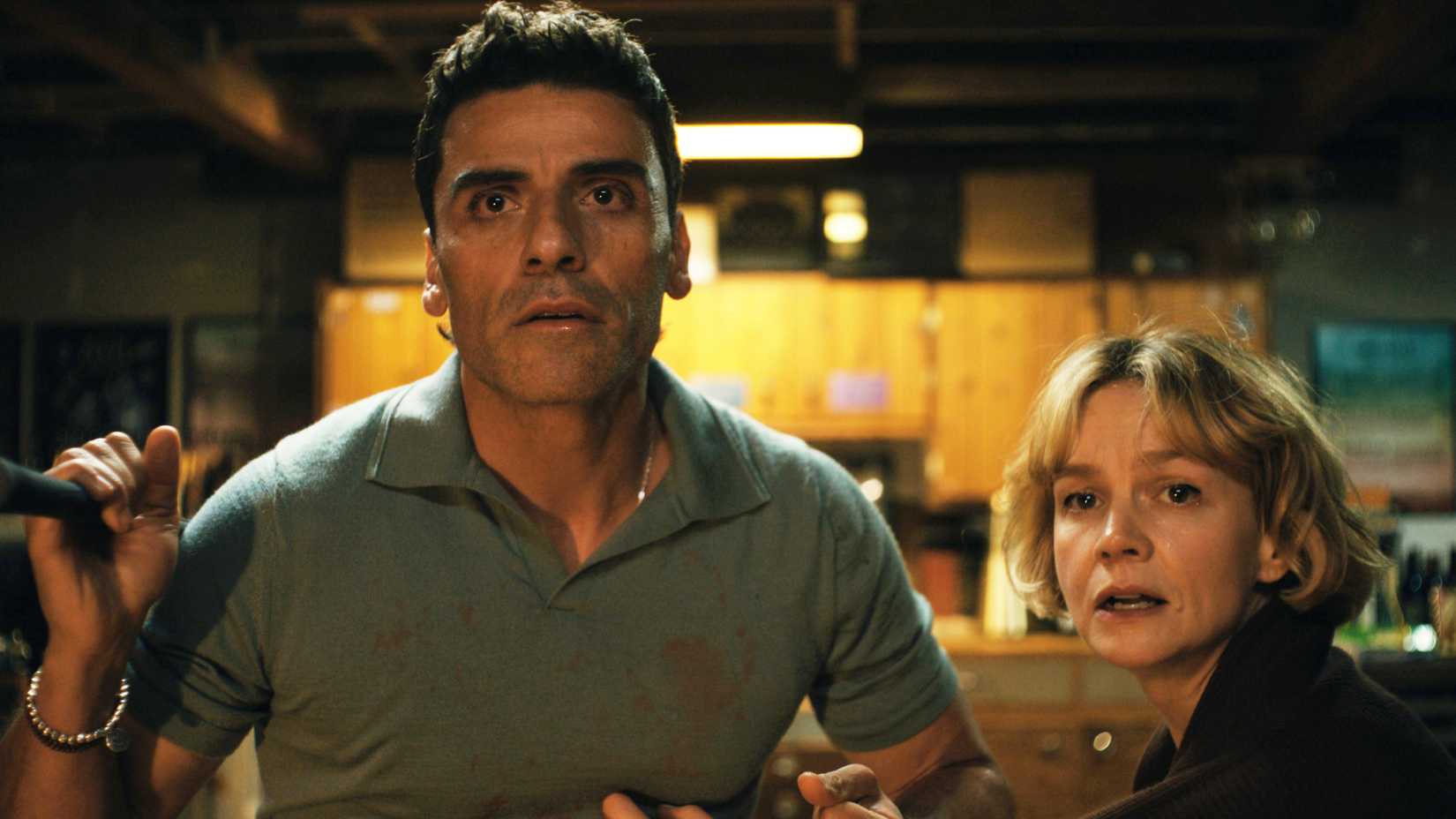 Oscar Isaac and Carey Mulligan looking shocked in Beef season 2