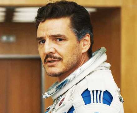 Pedro Pascal as Mr Fantastic in Fantastic Four First Steps looking offscreen