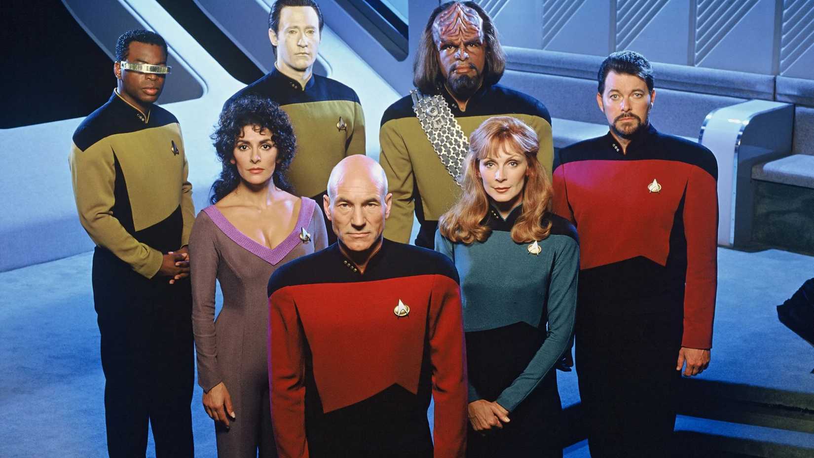 Publicity shot of the Star Trek The Next Generation cast staring at the camera