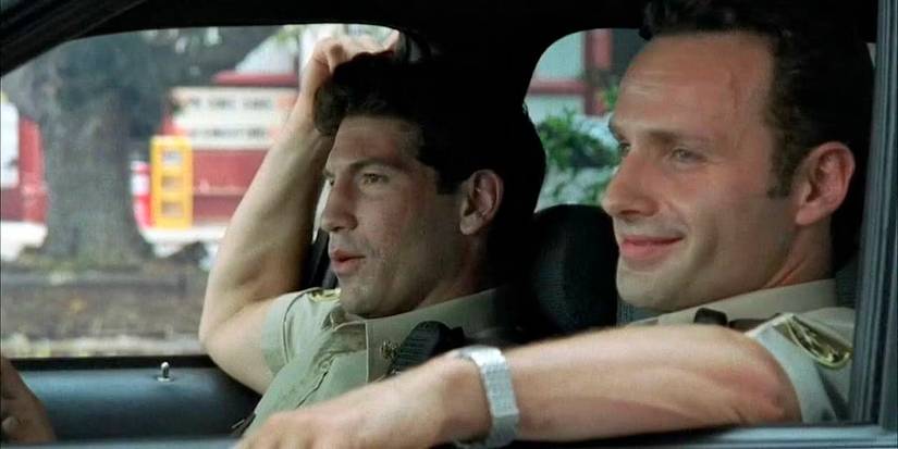 Rick (Andrew Lincoln) and Shane (Jon Bernthal) in police uniforms in The Walking Dead