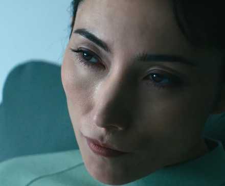 Dichen Lachman as Gemma stares intently at something off-camera in Severance Season 2 Episode 7.