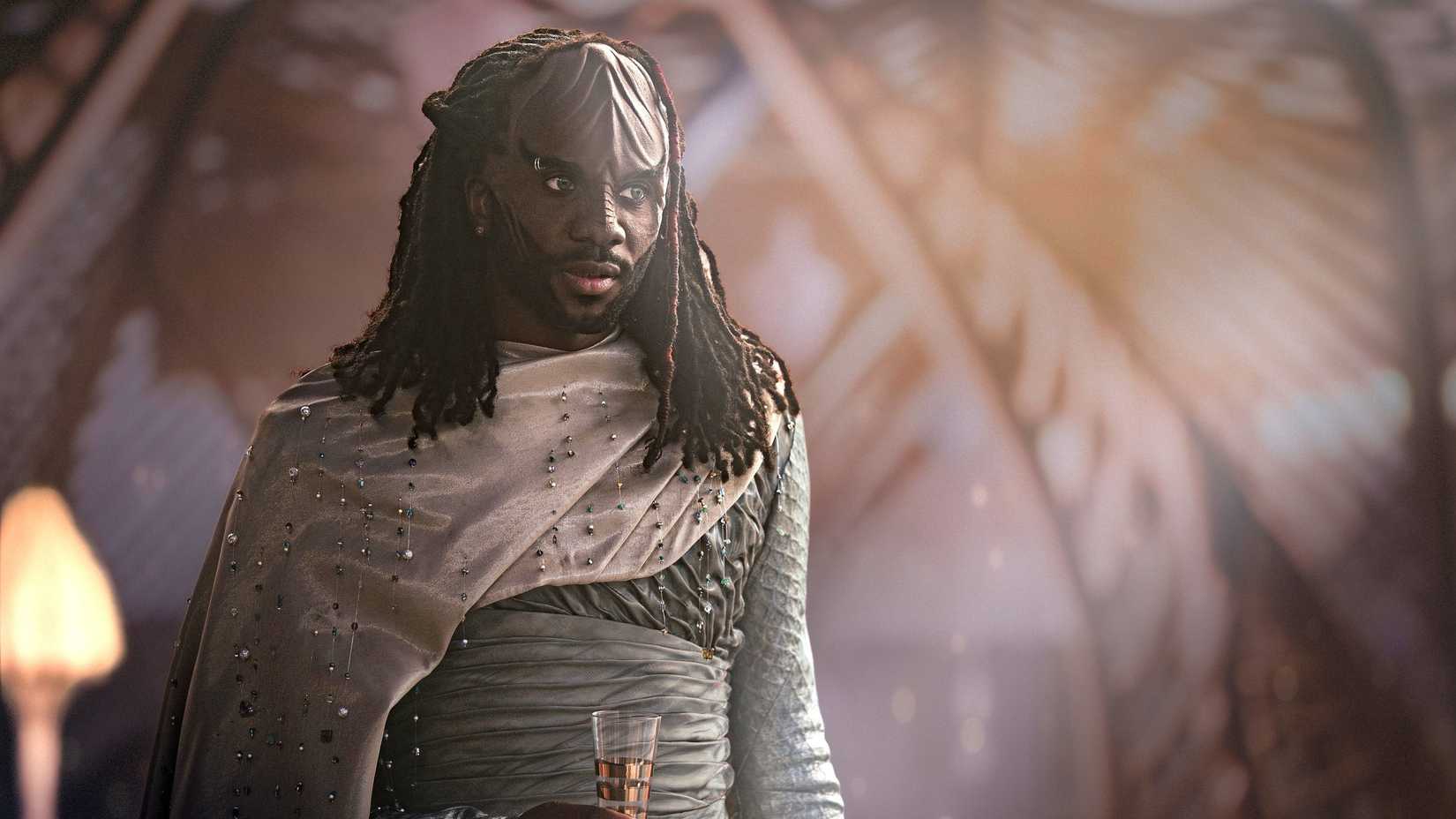 The Klingon Jay-Den Kraag (Karim Diané) wears sparkly Khionian formalwear in Starfleet Academy