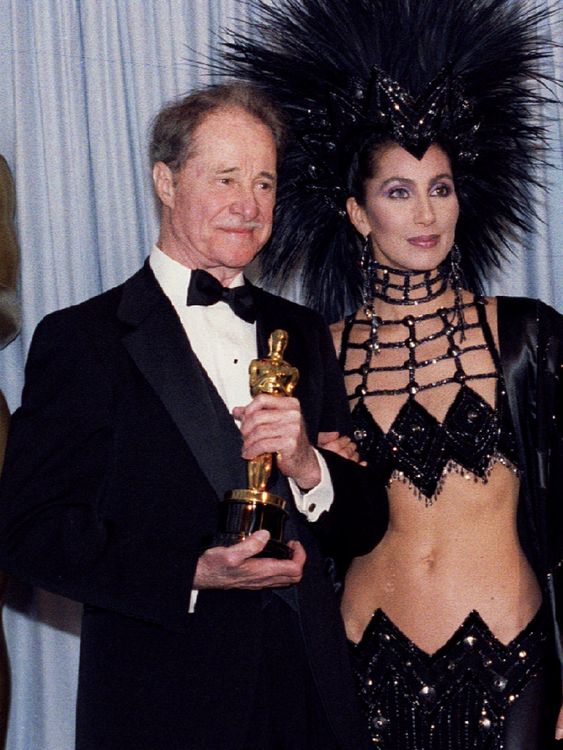 Cher told designer Bob Mackie 'I don't want to look like a housewife in an evening gown'. Mission very much accomplished, I say. Pictured here with actor Don Ameche at the 1986 Oscars. Pic: Reuters