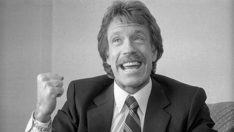 Chuck Norris speaks during a promotional tour of "The Delta Force" movie in 1986. Pic: Steve Ringman/San Francisco Chronicle via AP
