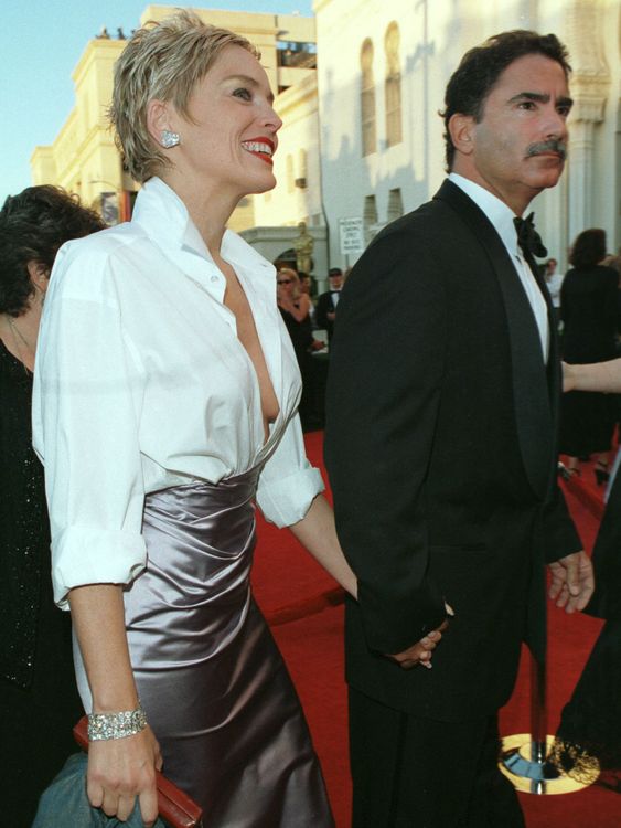High low fashion at its best, Sharon Stone in a Vera Wang skirt and her husband's Gap shirt in 1998 Oscars. So iconic, Zendaya referenced it in her 2022 look (scroll down). Pic: Reuters