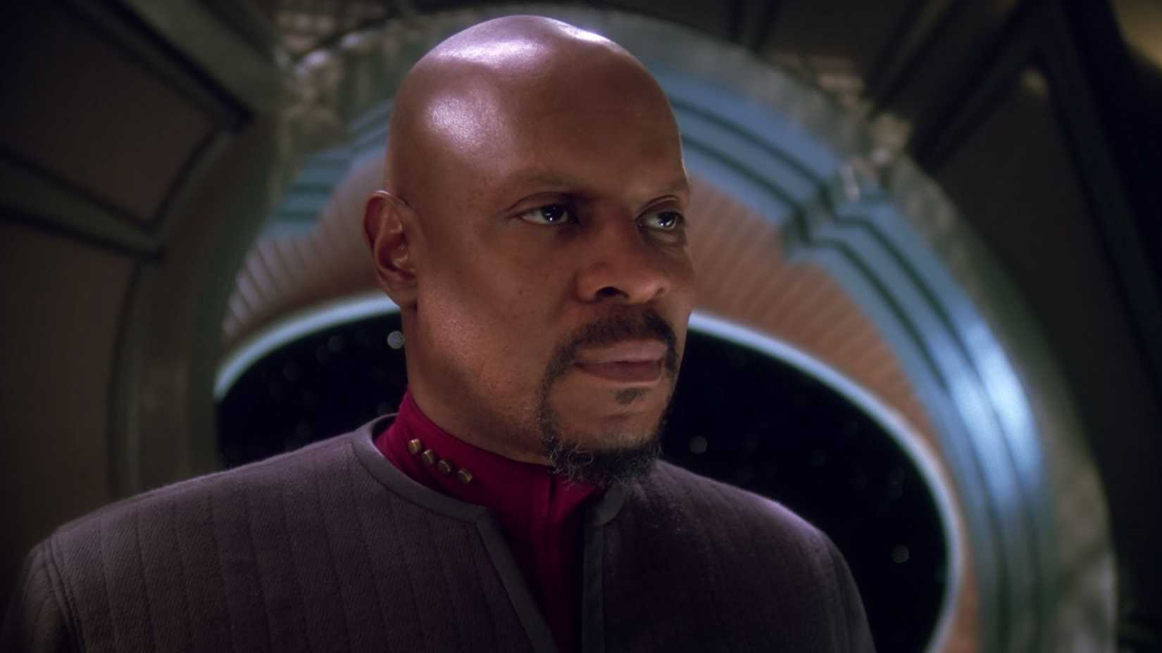 Ben Sisko looks on stoically in Star Trek Deep Space Nine