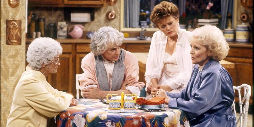 The cast of The Golden Girls sitting around the kitchen table