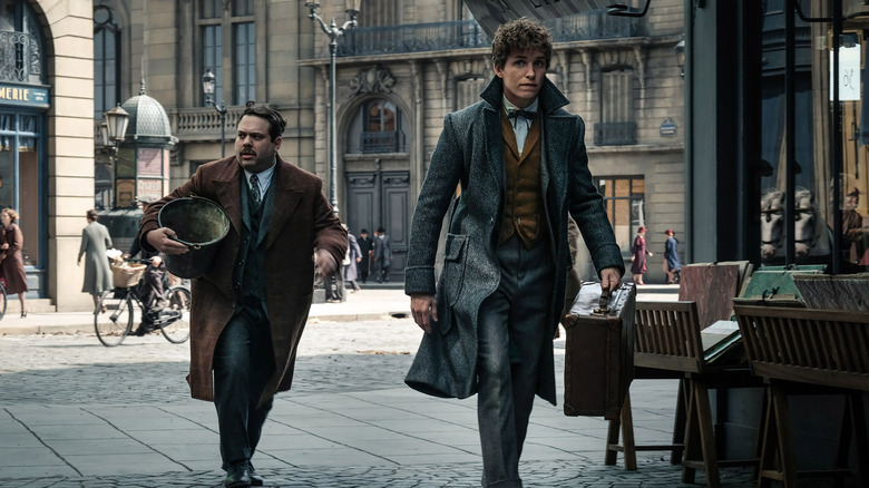 Jacob and Newt walking down the street in Fantastic Beasts and Where to Find Them