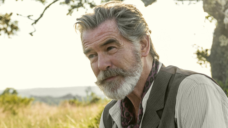 Eli McCullough (Pierce Brosnan) addresses a young girl in The Son