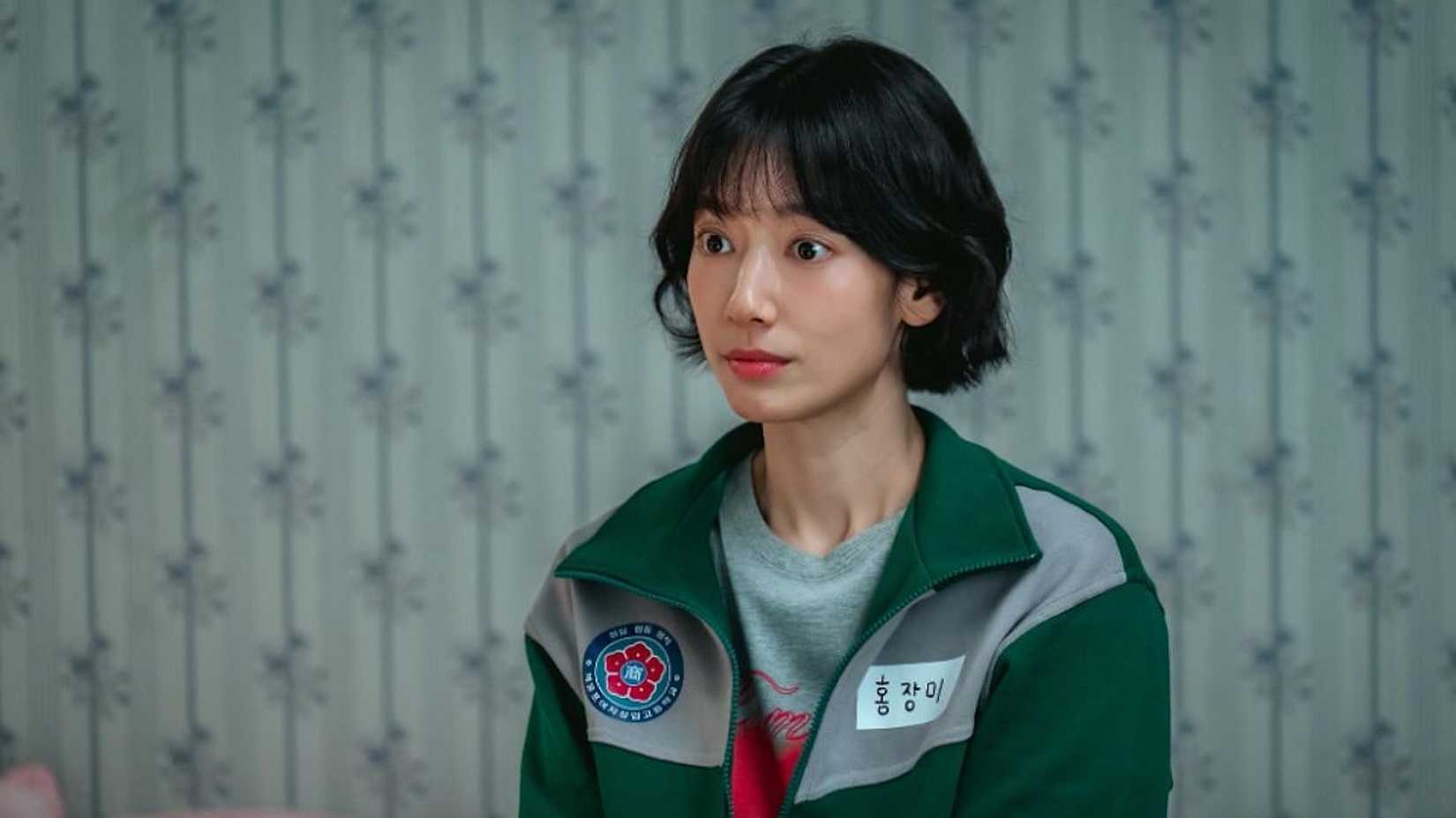A woman looking bemused in the K-drama Undercover Miss Hong.