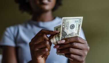 A person holding money.