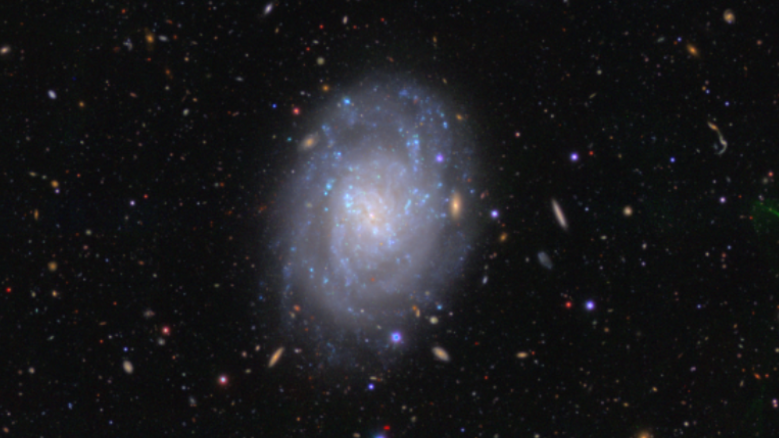 The spiral galaxy NGC 941 looks like a spinning cosmic wheel in new image from the Subaru Telescope