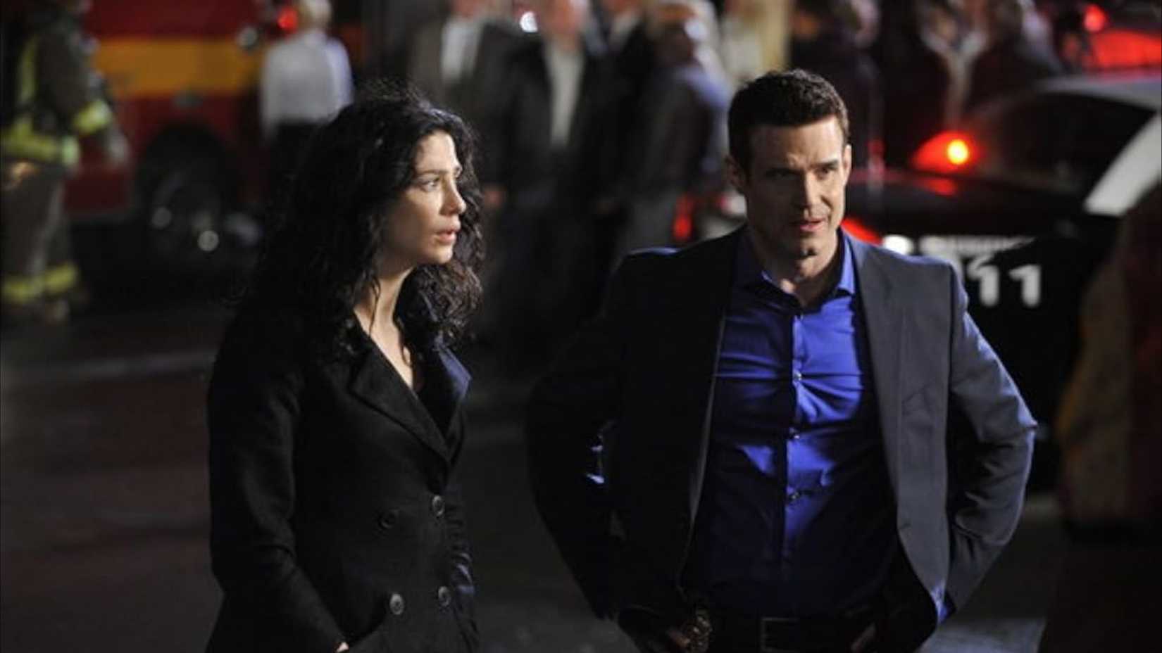 Joanne Kelly and Eddie McClintock in Warehouse 13 Season 4