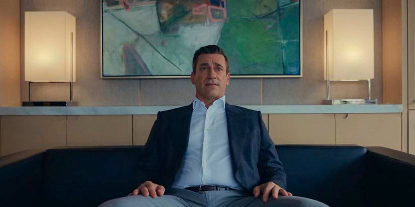 Andrew Cooper (Jon Hamm) sitting in an armchair in Your Friends and Neighbors Season 1 Ep 9