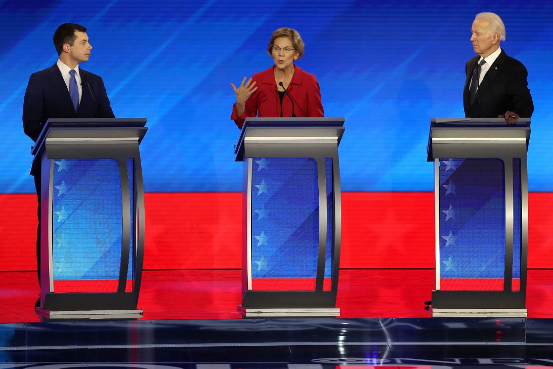 Pete Buttigieg, Elizabeth Warren and Joe Biden participate in a Democratic presidential primary debate in Manchester, New Hampshire, in February 2020.