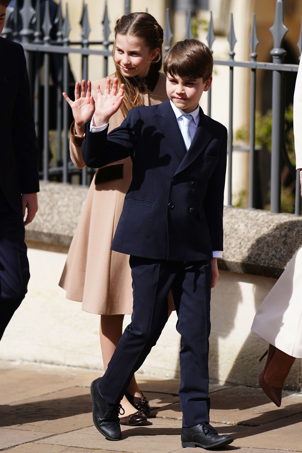 Louis waves to the crowds