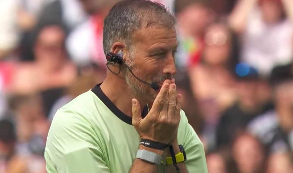 Mark Clattenburg puts his hands to his face