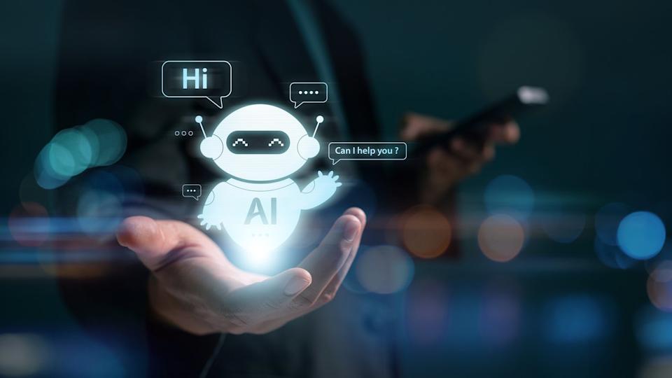 An AI bot sitting on a human palm.