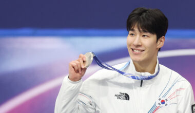Short track speed skater Hwang Dae-heon celebrates after winning the silver medal in the men