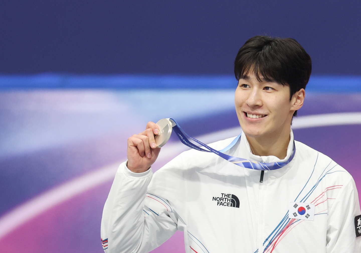 Short track speed skater Hwang Dae-heon celebrates after winning the silver medal in the men