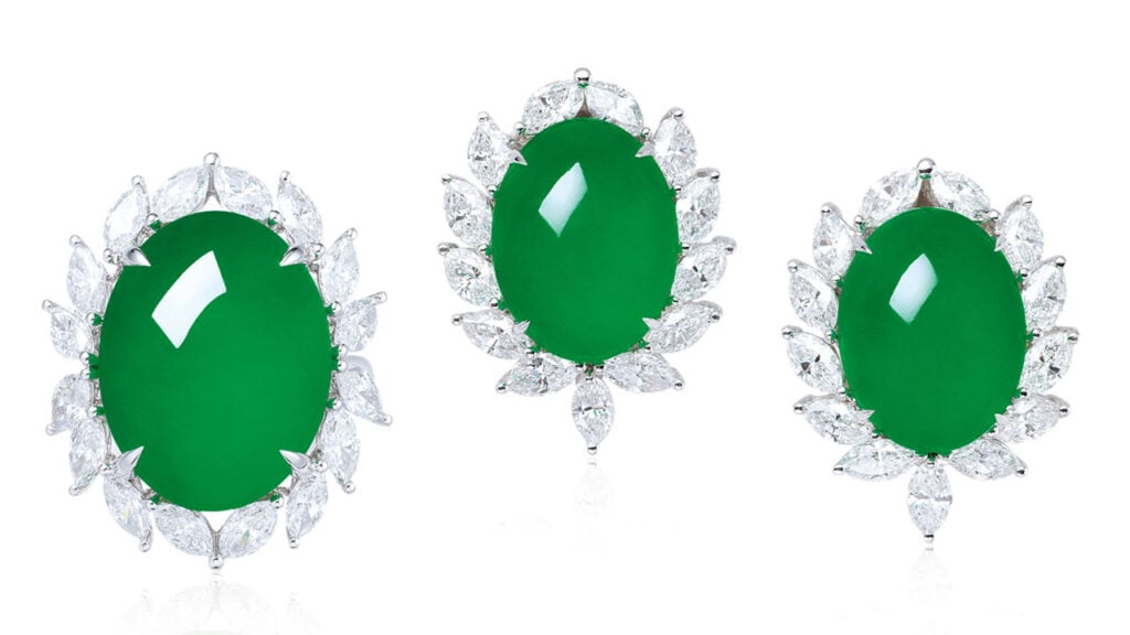 A ring and a pair of earrings with jadeite cabochons in marquise-cut diamond surrounds at Poly Auction image