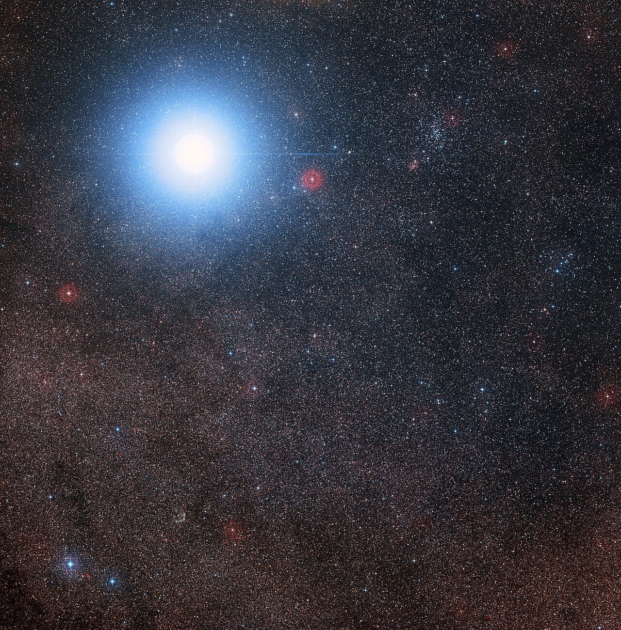 This image of the sky around the bright star Alpha Centauri AB also shows the much fainter red dwarf star, Proxima Centauri, the closest star to the Solar System and maybe the destination for our first interstellar craft driven by light propulsion (Credit : Digitised Sky Survey 2)