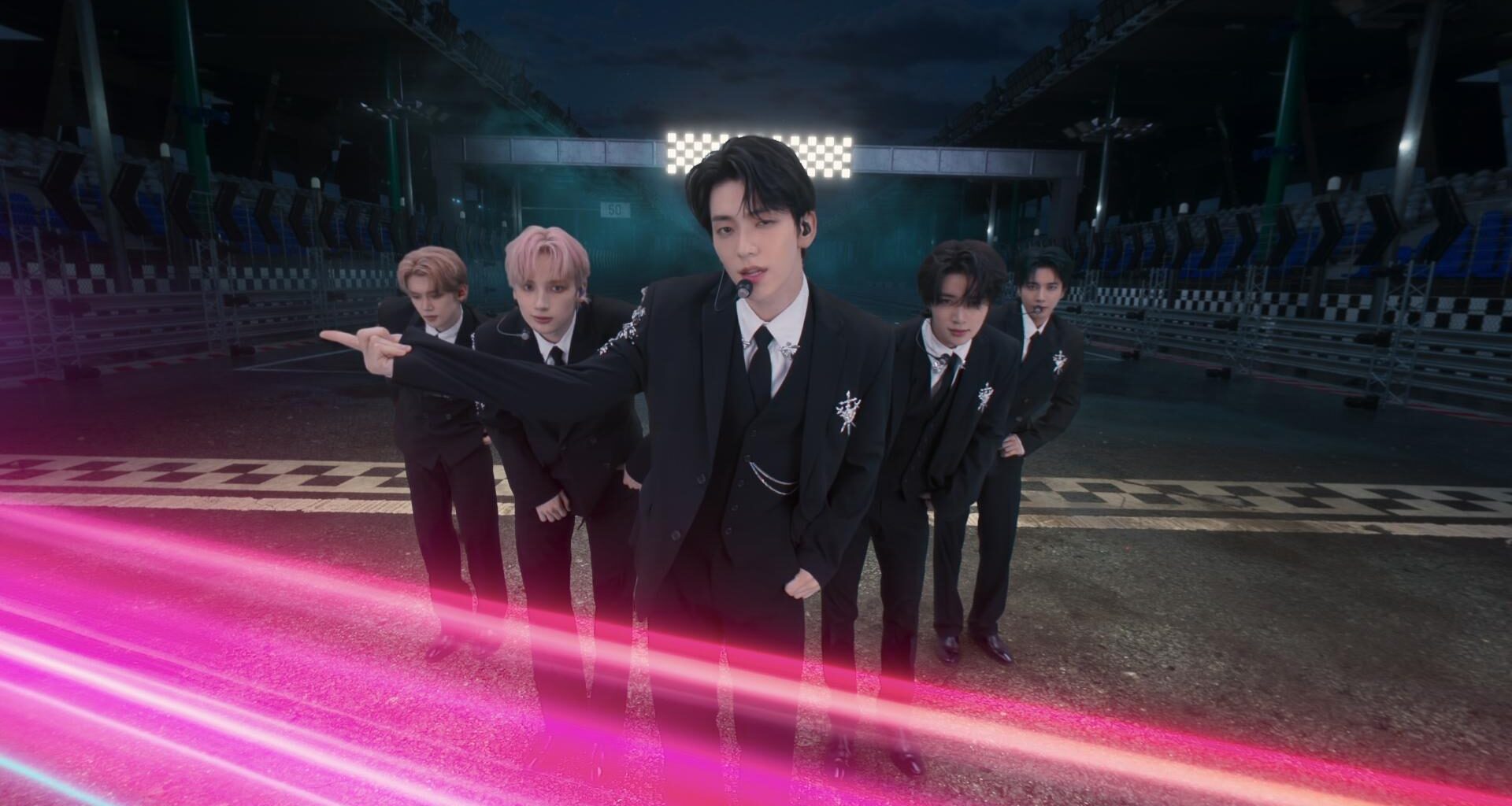 Members of K-pop boy band TXT perform during the group