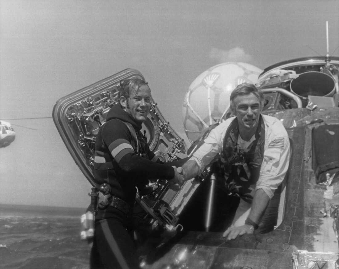 NASA astronaut Eugene Cernan, commander of the Apollo 17 lunar mission, is welcomed back to Earth after splashing down in the Pacific Ocean on Dec. 19, 1972.