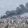 Smoke rises over Lebanon's capital of Beirut following Israeli airstrikes on Wednesday. Israel said it was targeting Iran-backed Hezbollah, despite a U.S. ceasefire with Iran.