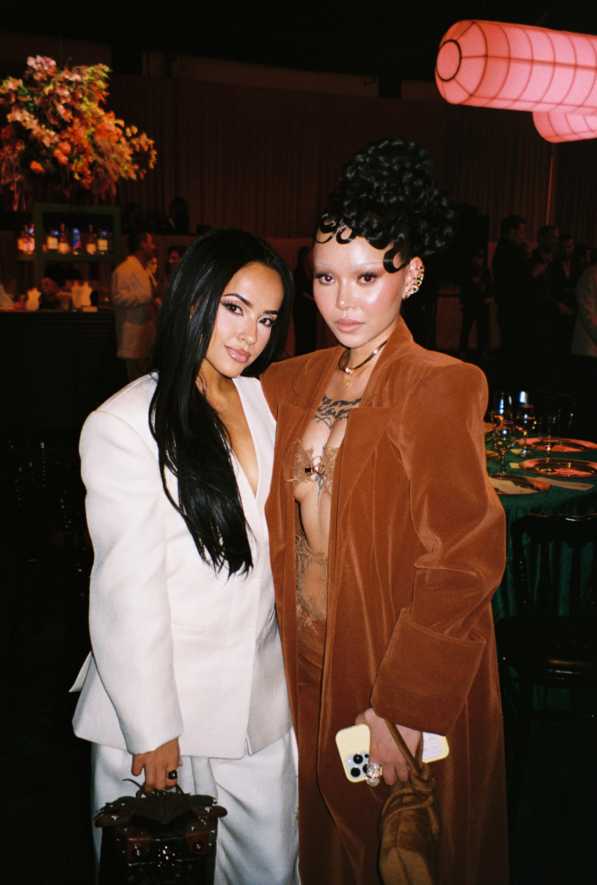 Becky G and Bella Poarch.