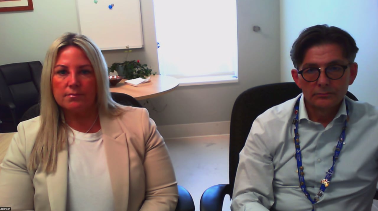 Two people sitting 