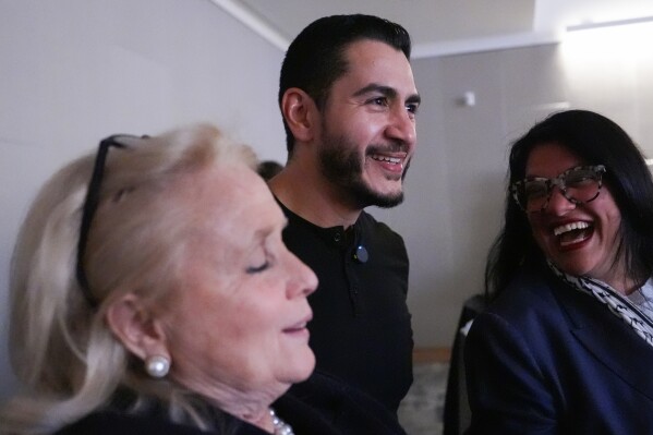 Rep. Debbie Dingell, D-Mich., left, Abdul El-Sayed, a progressive candidate in the Democratic primary for U.S. Senate in Michigan, center, and Rep. Rashida Tlaib, D-Mich., speak during a campaign event for El-Sayed, Tuesday, April 7, 2026, at the University of Michigan in Ann Arbor, Mich. (AP Photo/Julia Demaree Nikhinson)