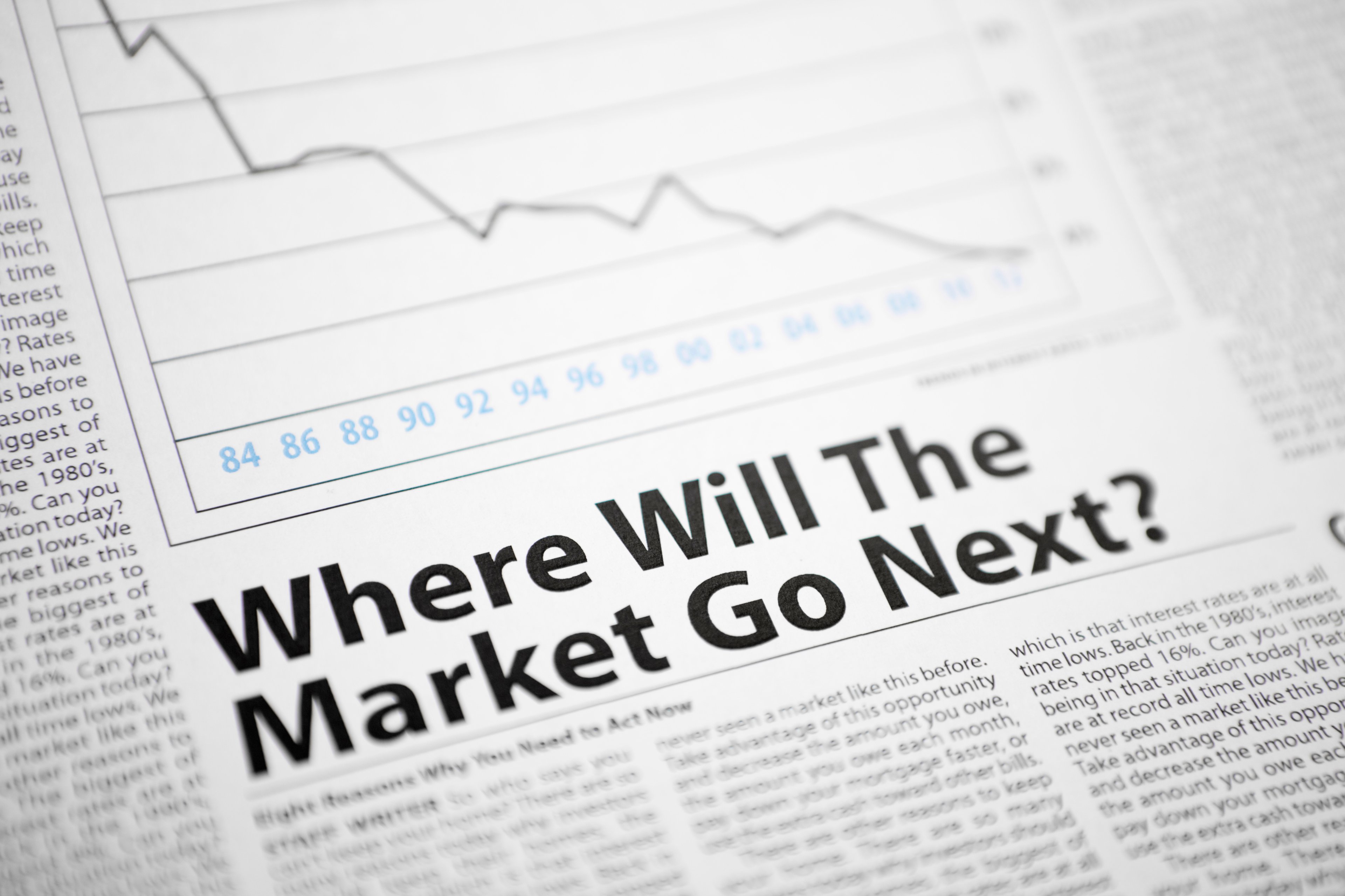 A financial newspaper depicting a declining stock chart and the phrase, Where Will the Market Go Next?