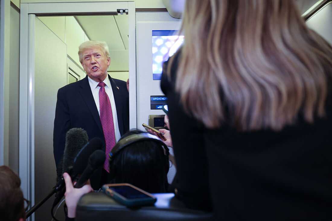 U.S. President Donald Trump speaks to members of the press aboard Air Force One on April 17, 2026 just prior to landing at Joint Base Andrews, Maryland. Trump said the United States received favorable news related to Iran just prior to landing at Joint Base Andrews. (Photo by Win McNamee/Getty Images)