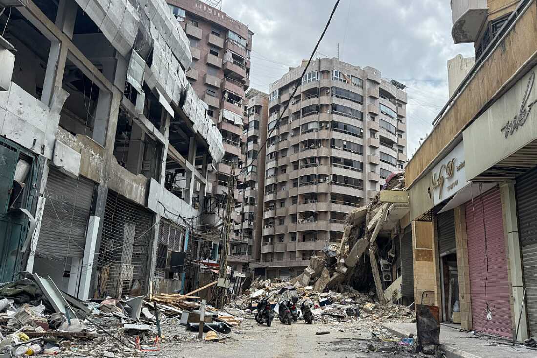 Buildings damaged by Israeli airstrikes are seen in the Haret Hreik neighborhood of Dahieh in Beirut's southern suburbs on Sunday, days after a 10-day ceasefire took effect at midnight going into Friday.