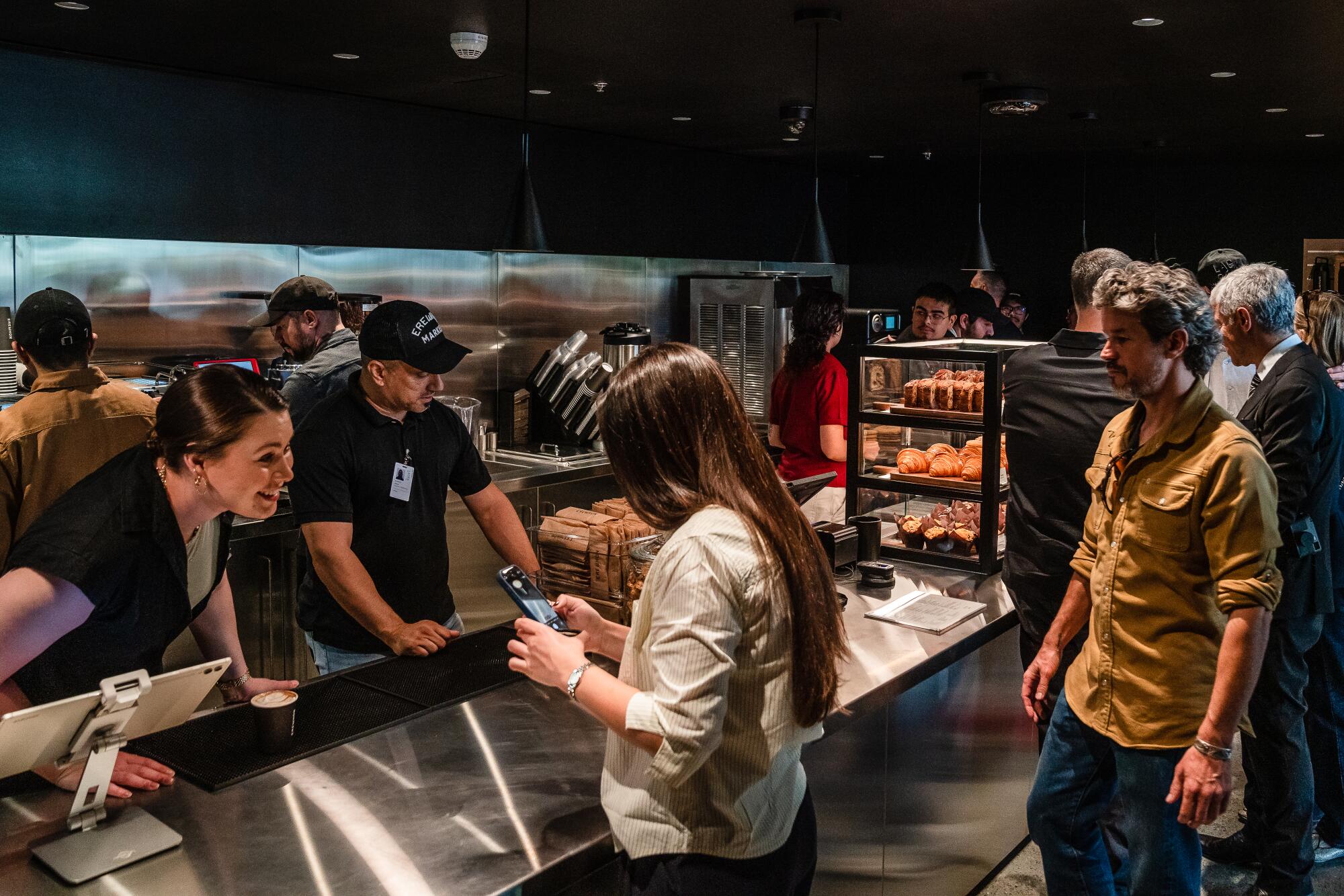 People ordering inside Erewhon at LACMA.