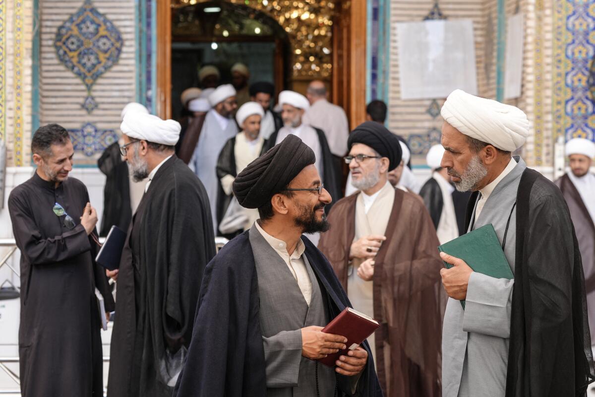 Shia clerics gather inside the Imam Ali Shrine in the Old City of Najaf on April 22, 2026.