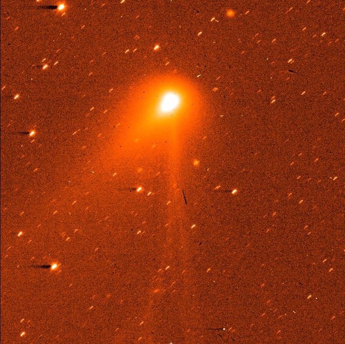 A streak against the darkness of space changes color from red to blue