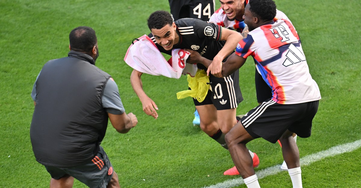 Bayern Munich’s Jamal Musiala gets mobbed following Mainz win