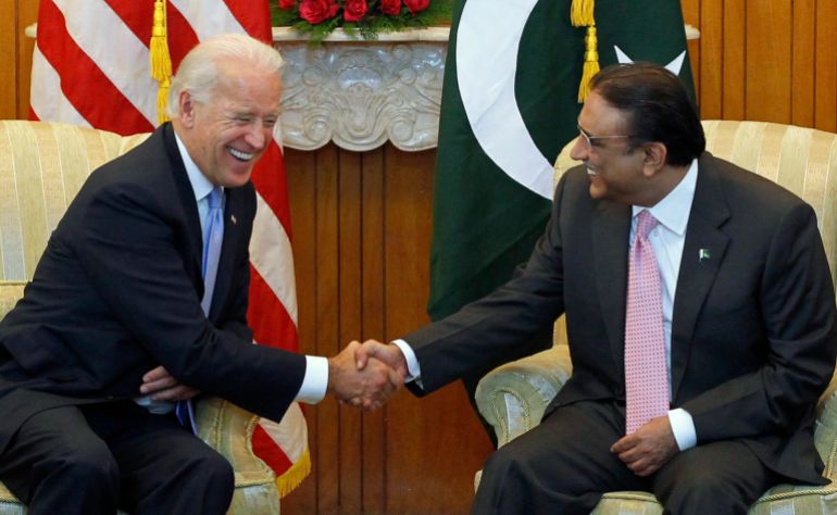 U.S. Vice President Joe Biden (L) shares a laugh while sitting down to meet with Pakistan's President Asif Ali Zardari at the President House in Islamabad January 12, 2011. Biden will pressure Pakistan to intensify its crackdown on militants in talks on Wednesday with Pakistan's leadership, but will tread carefully to avoid further straining ties. REUTERS/Adrees Latif (PAKISTAN - Tags: POLITICS)