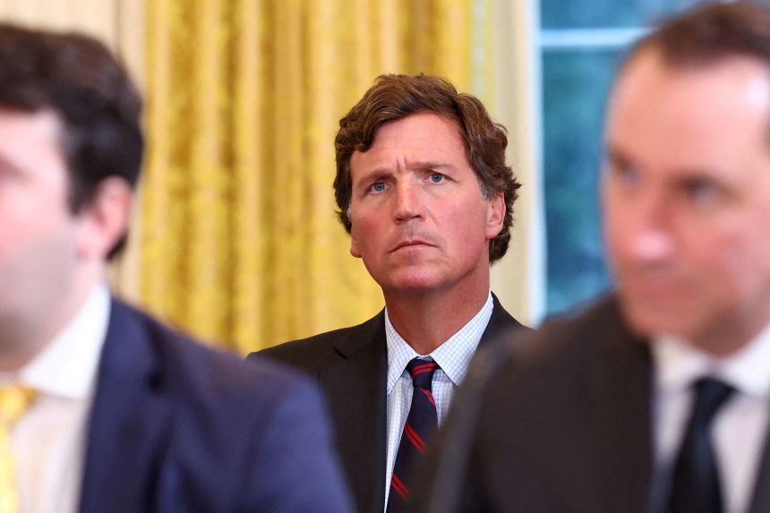Tucker Carlson attends President Donald Trump's meeting with an oil industry executives, held at the White House on January 9.