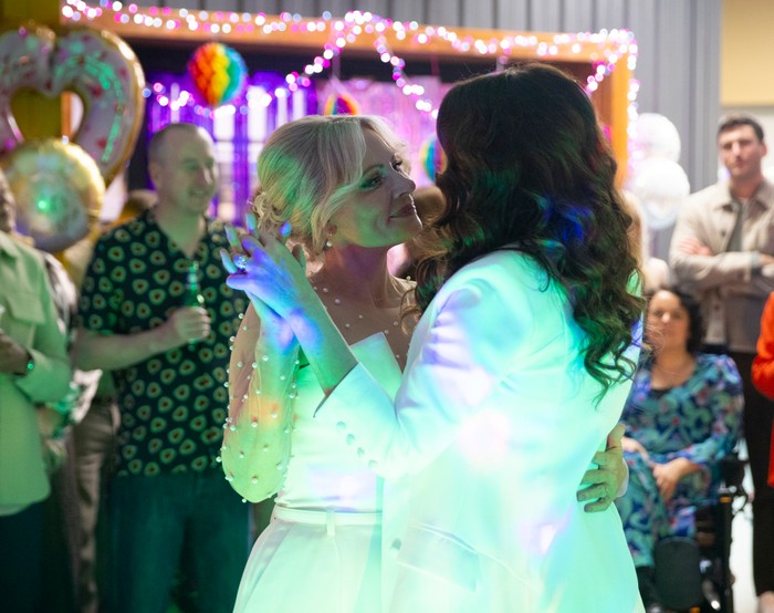 Carla and Lisa share their first dance in Coronation Street