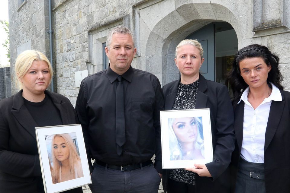 James Johnston with his wife Carol, (centre right) and daughters Kate (left) and Meagan (right) at an inquest for his daughter Aoife. Photo: Brendan Gleeson.