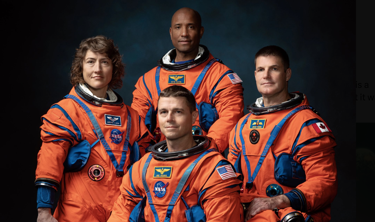 promo image of four astronauts in orange spacesuits